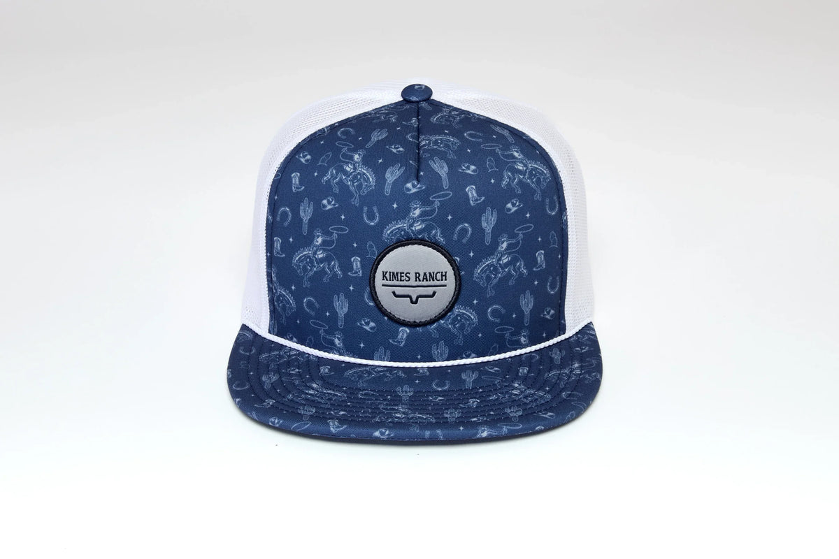 Kimes Ranch Rancho hat in Carbon Blue with white mesh and a repeating cowboy pattern with a Kimes Ranch logo patch