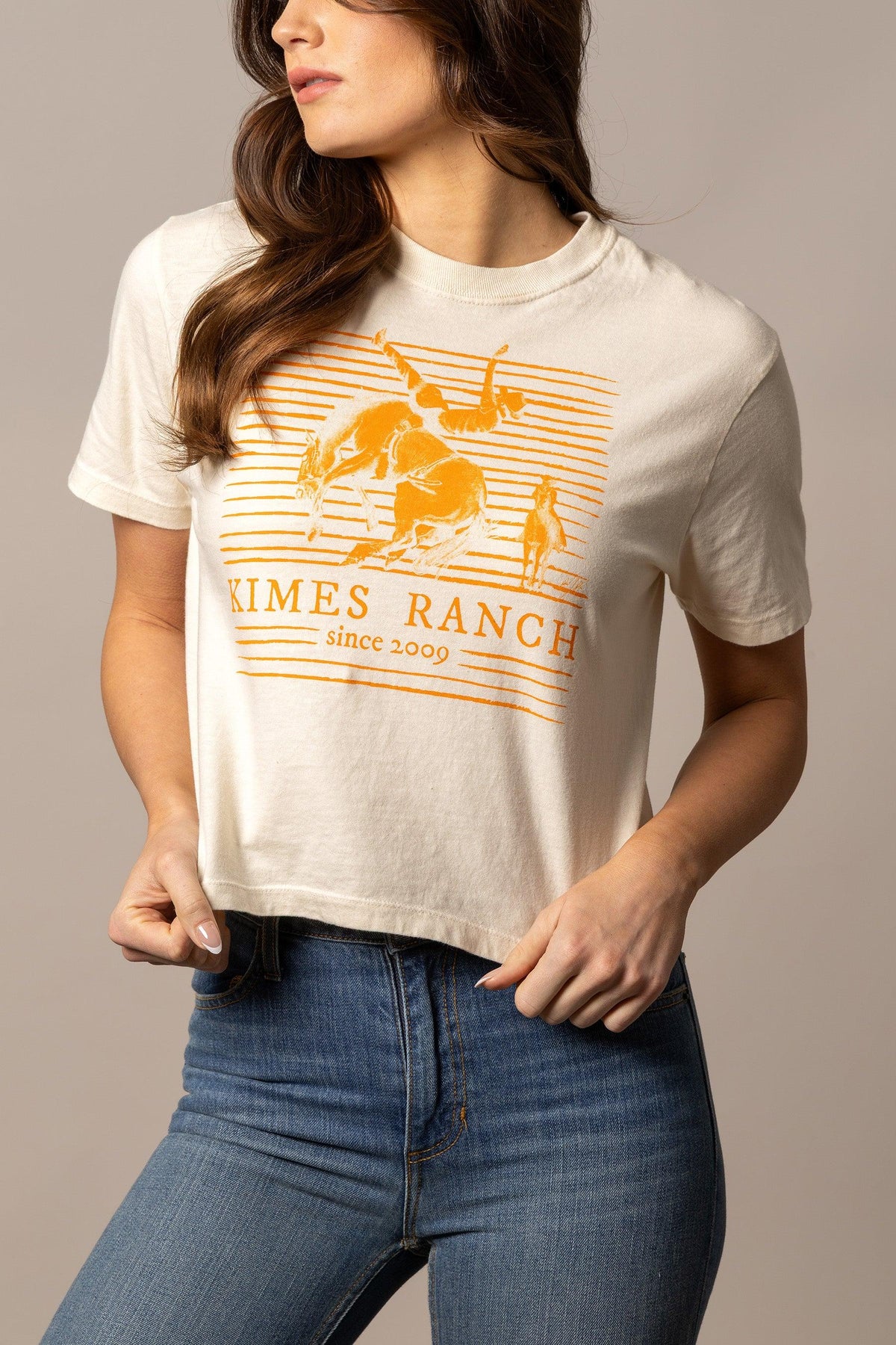 Kimes Ranch Randy Bareback shirt in Ivory with a graphic of a cowboy riding a bucking horse