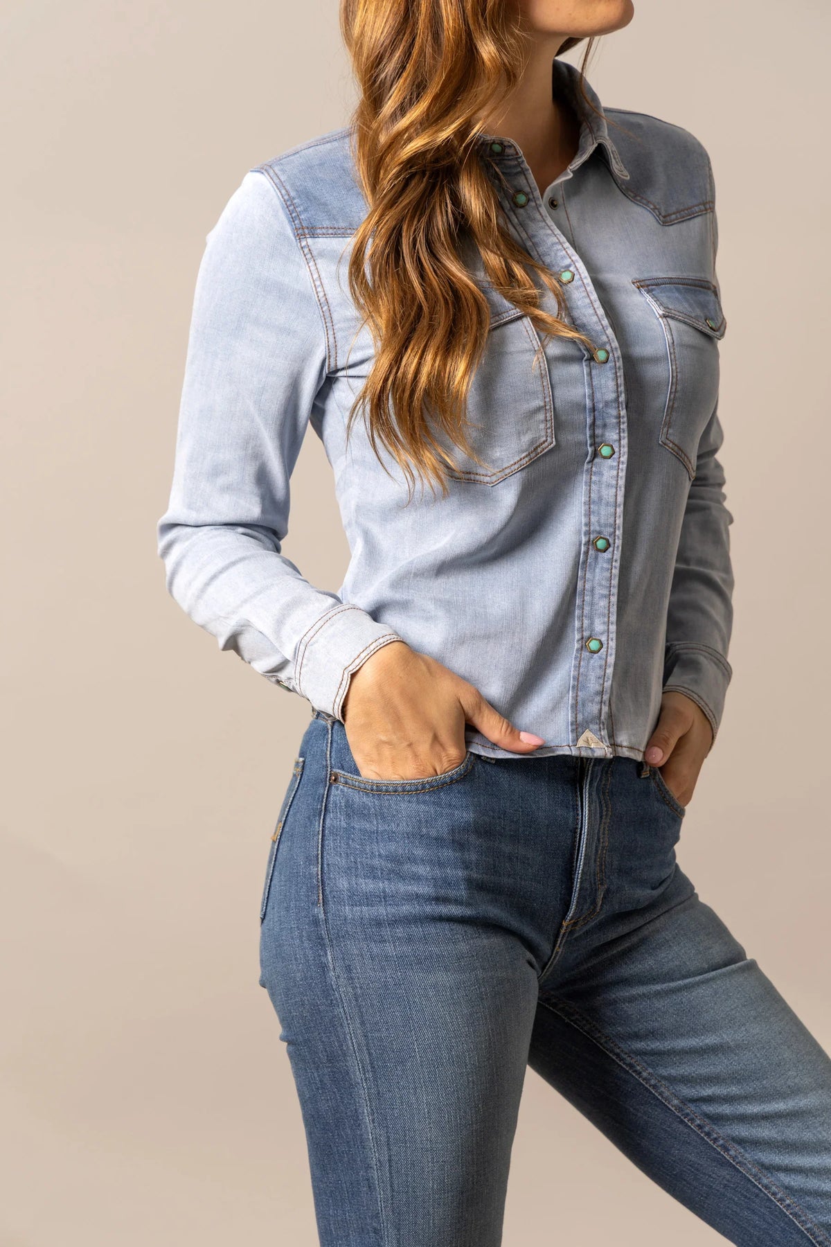 Kimes Ranch Rayna top in Light Wash Indigo with long sleeves and two chest pockets
