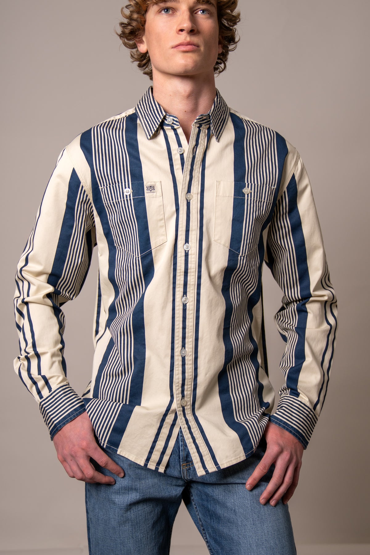 Kimes Ranch Reddy dress shirt in Blue with wide vertical stripes and two chest pockets with button flaps