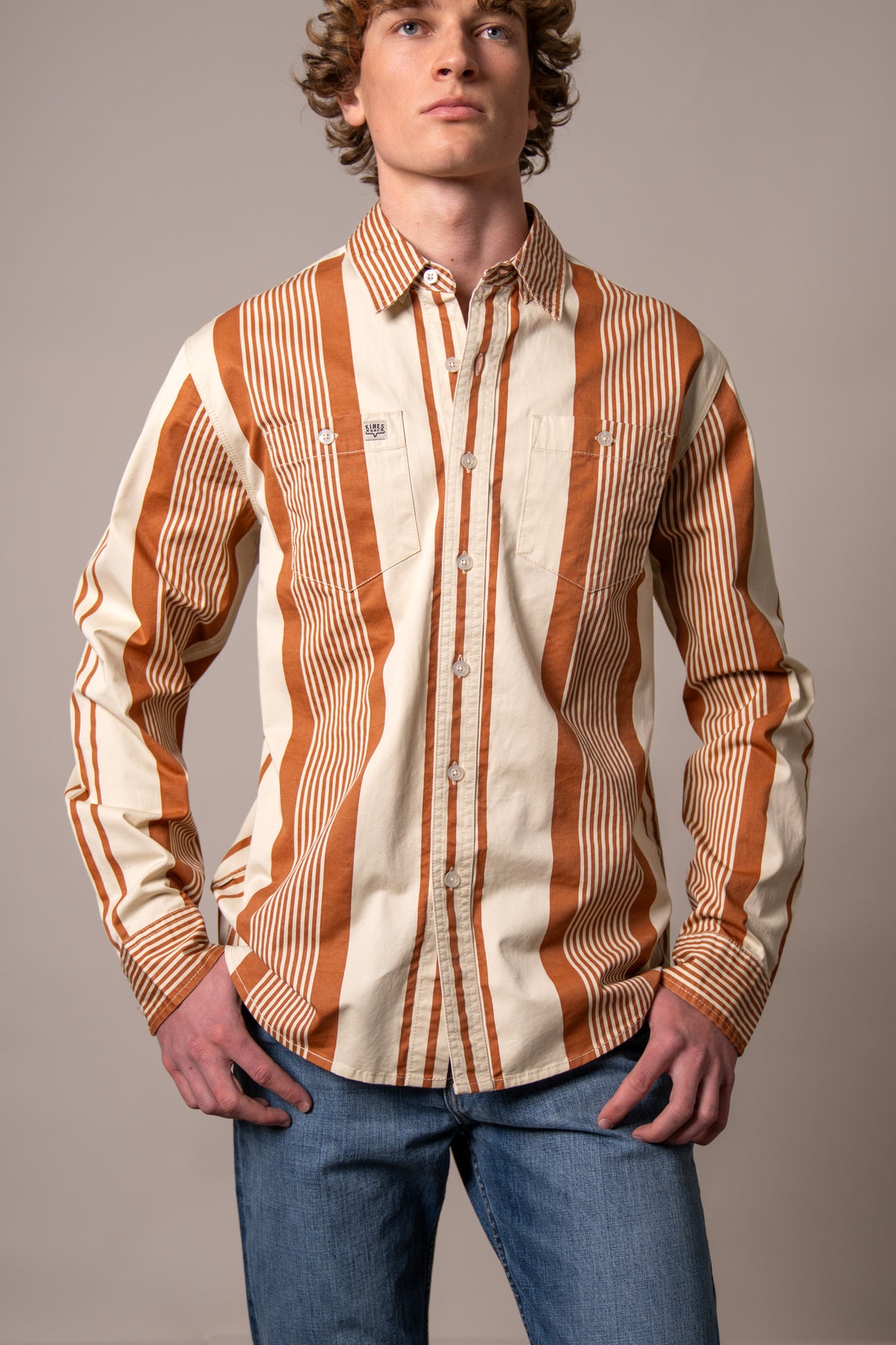 Kimes Ranch Reddy dress shirt in Bran with wide vertical stripes and two chest pockets