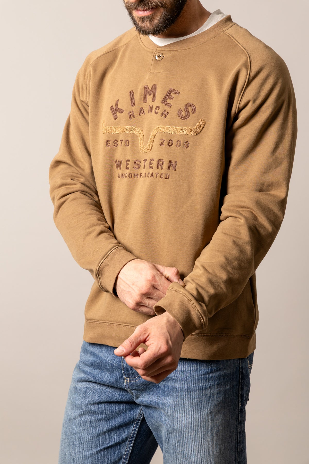 Kimes Ranch Reeves sweatshirt in Work Wear Brown with a graphic featuring the Kimes Ranch logo