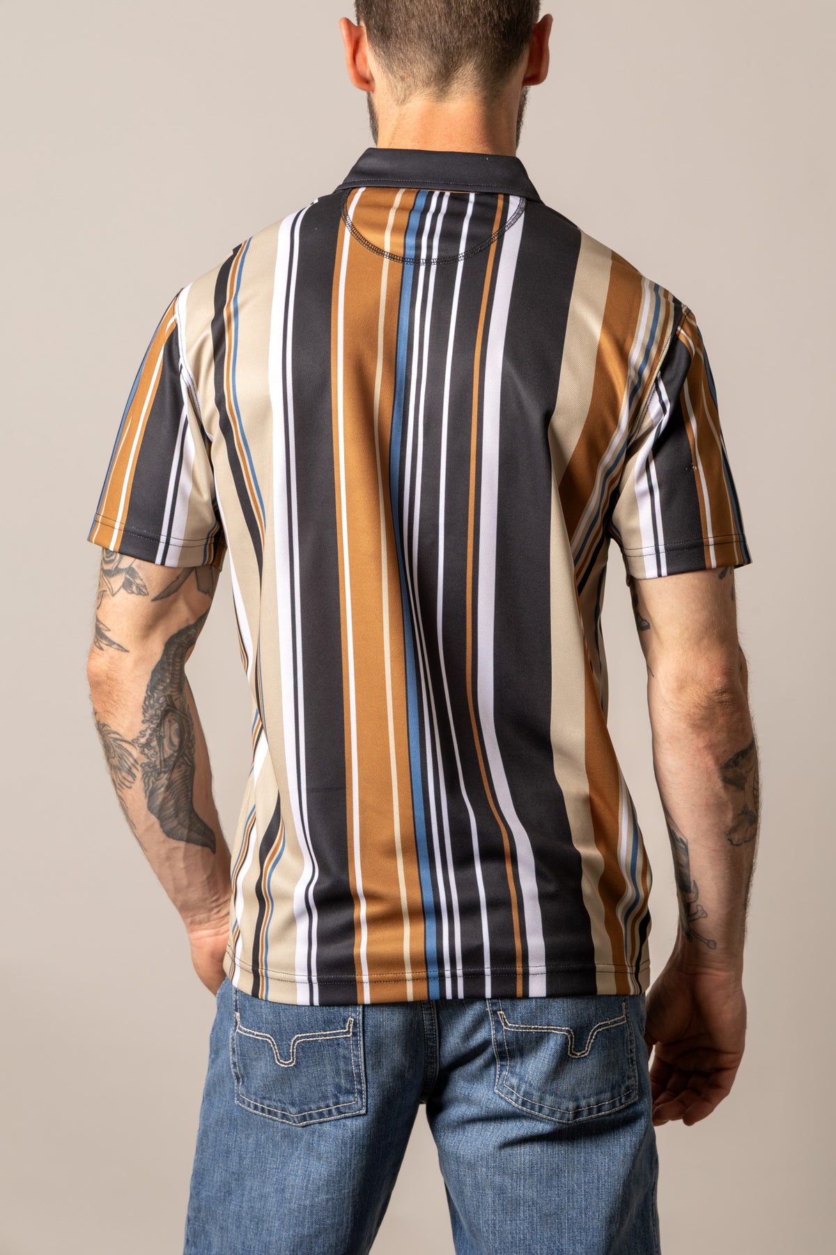 Kimes Ranch Rein polo shirt in Black, back view, with vertical stripes in tan, white, and blue