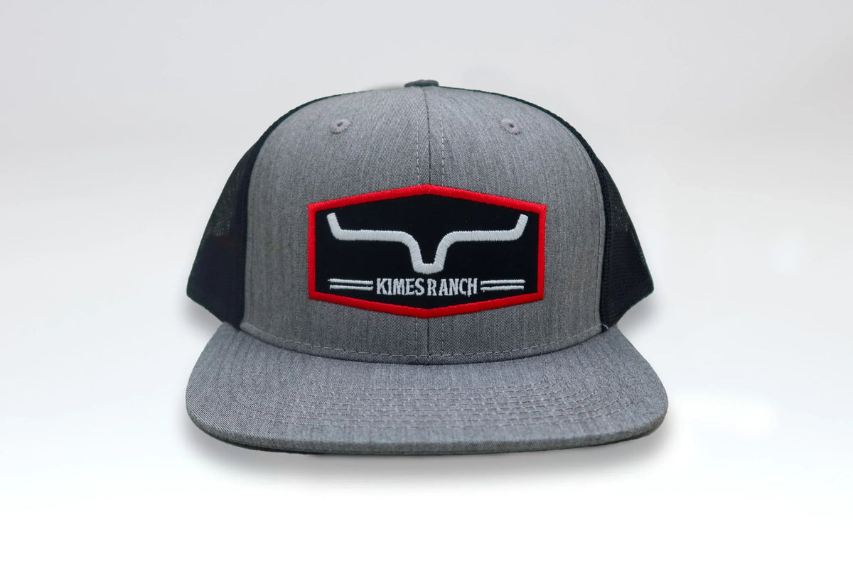 Kimes Ranch Replay Trucker Hat in Heather Grey with a front Kimes Ranch logo patch