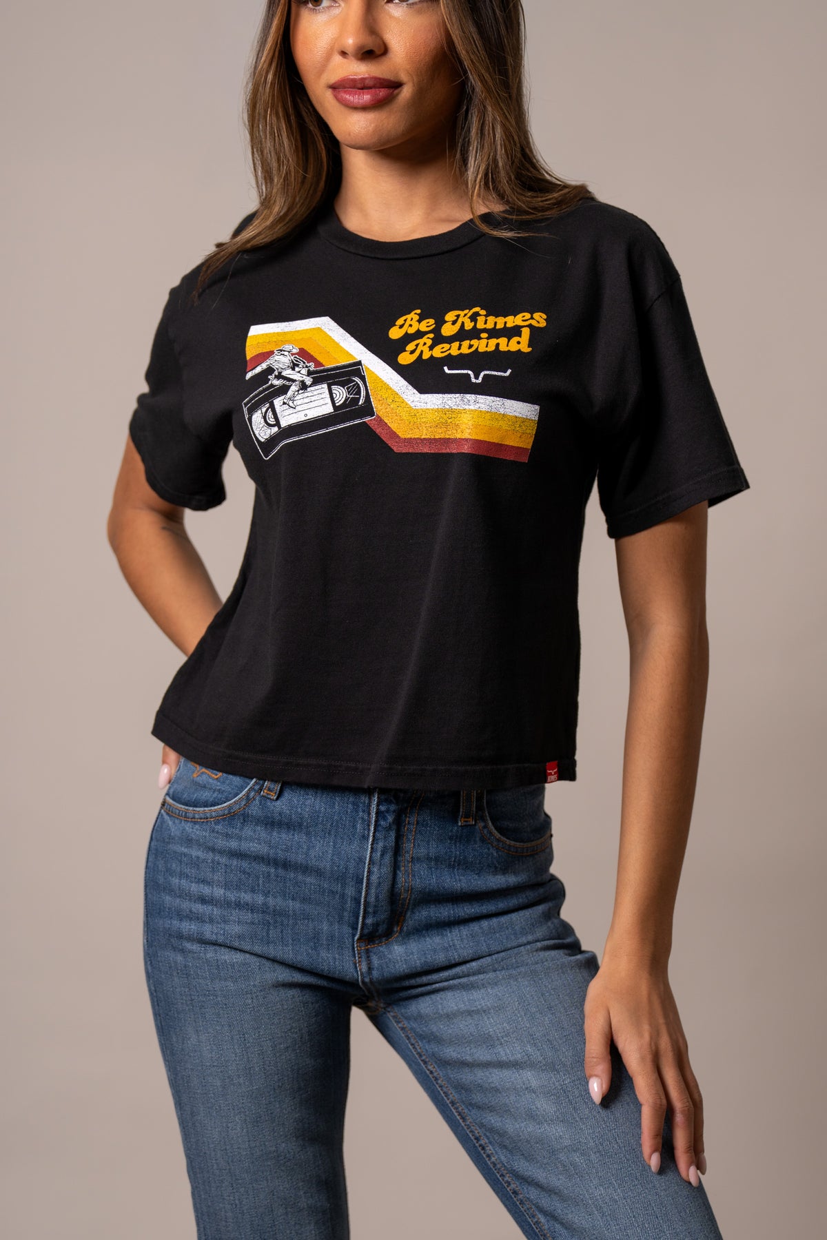 Kimes Ranch Rewind shirt in Black with a retro cassette tape graphic and "Be Kimes Rewind" text