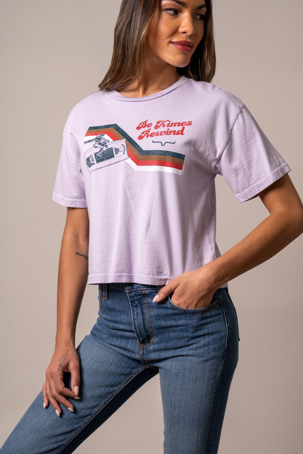 Kimes Ranch Rewind shirt in Lavender with a graphic of a cassette tape and the text Be Kimes Rewind