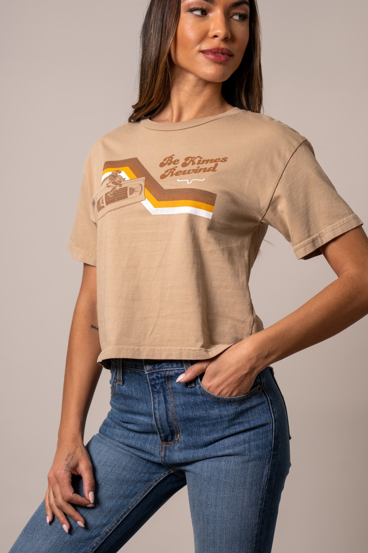 Kimes Ranch Rewind shirt in Tan with a retro cassette tape graphic and Be Kimes Rewind text