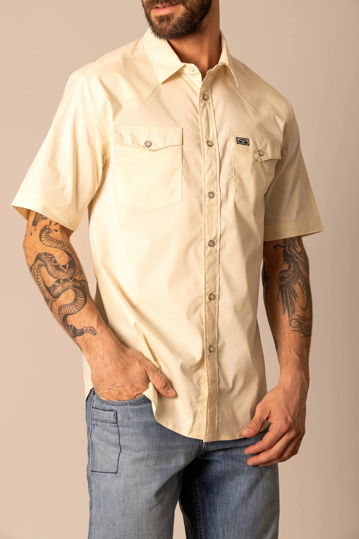 Kimes Ranch Rio Short Sleeve Dress Shirt in Natural with a collar, button front, and two chest pockets with button flaps