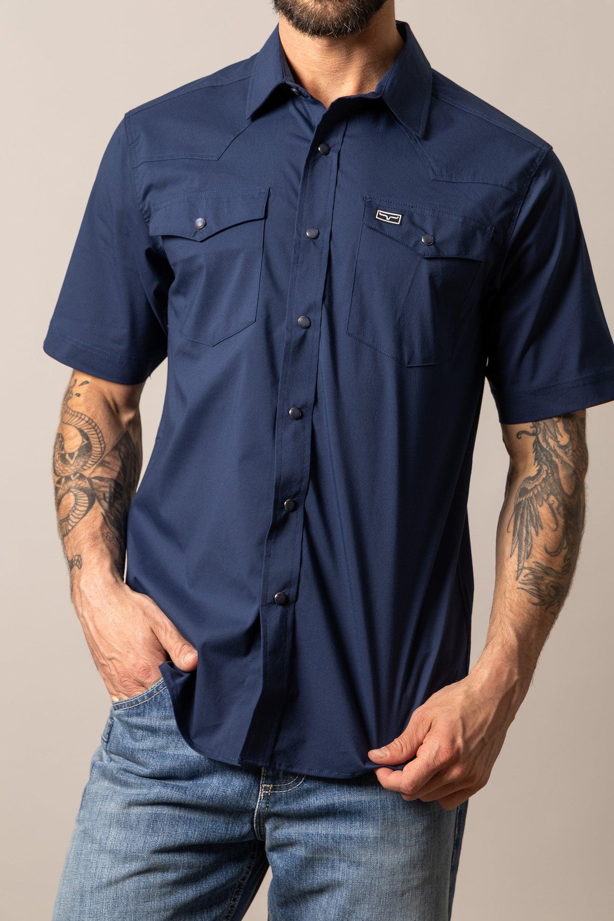 Kimes Ranch Rio Short Sleeve Dress Shirt in Navy with a button front and two chest pockets