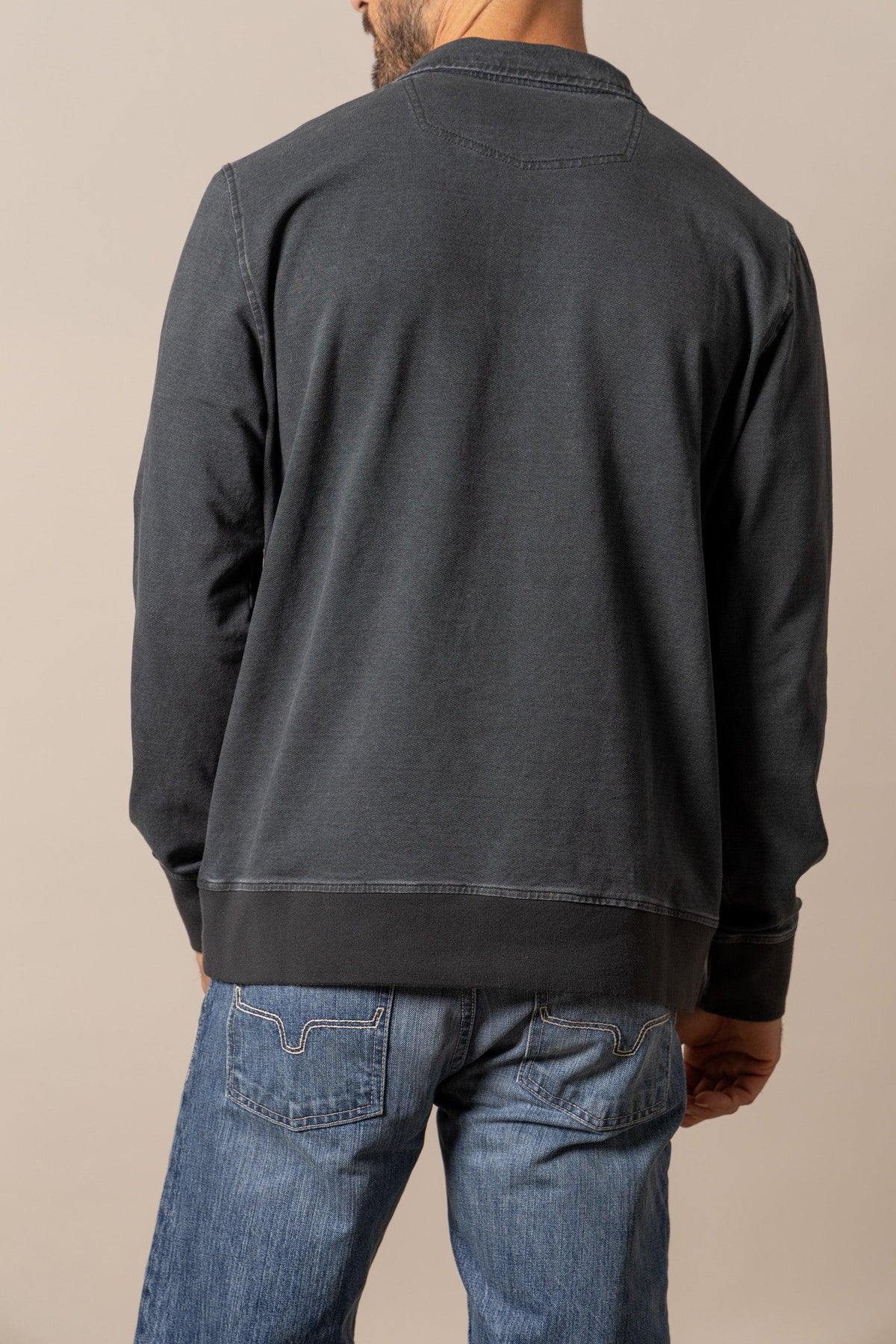 Kimes Ranch Rowell Pullover sweatshirt in Charcoal, back view, with ribbed hem and cuffs
