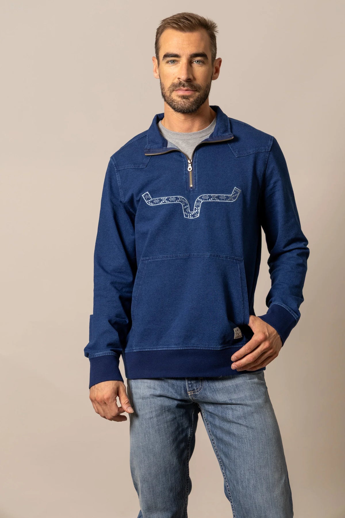 Kimes Ranch Rowell Pullover sweatshirt in Indigo with a half-zip collar and a longhorn graphic on the chest