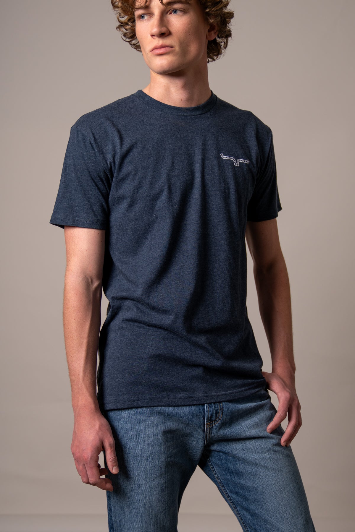 Kimes Ranch Rowell shirt in Midnight Navy with short sleeves and the Kimes Ranch logo on the chest