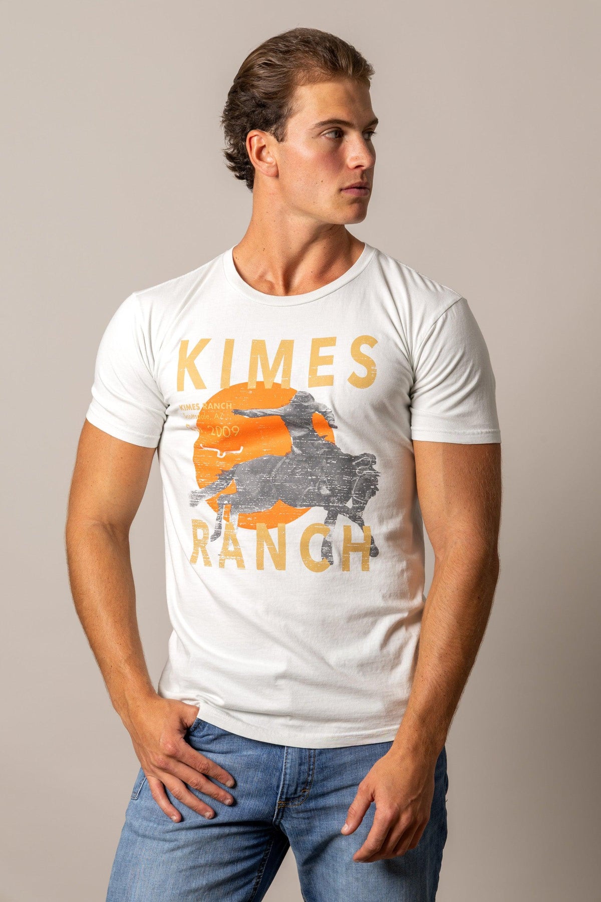 Kimes Ranch Runaway shirt in Off White with a graphic of a running bison and the words KIMES RANCH