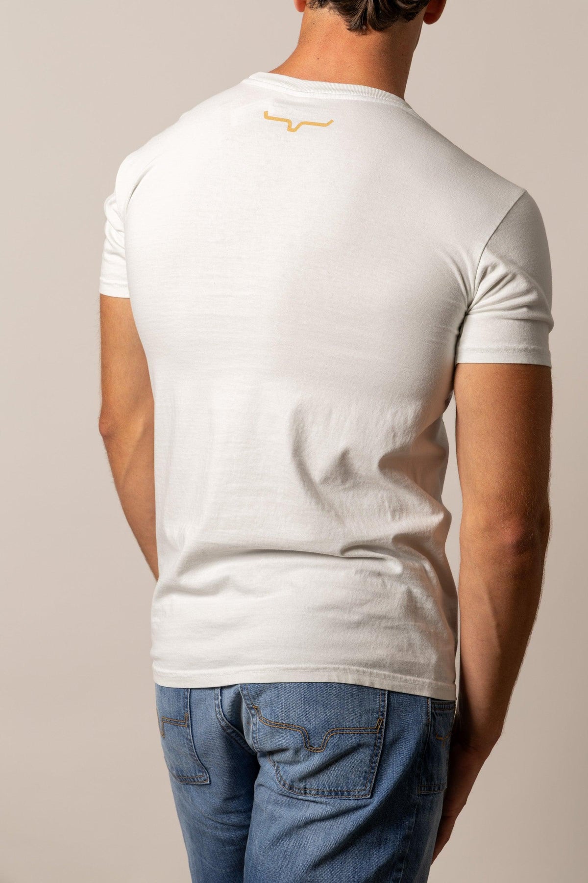 Kimes Ranch Runaway shirt in Off White, back view, with a small gold Kimes Ranch logo at the back yoke