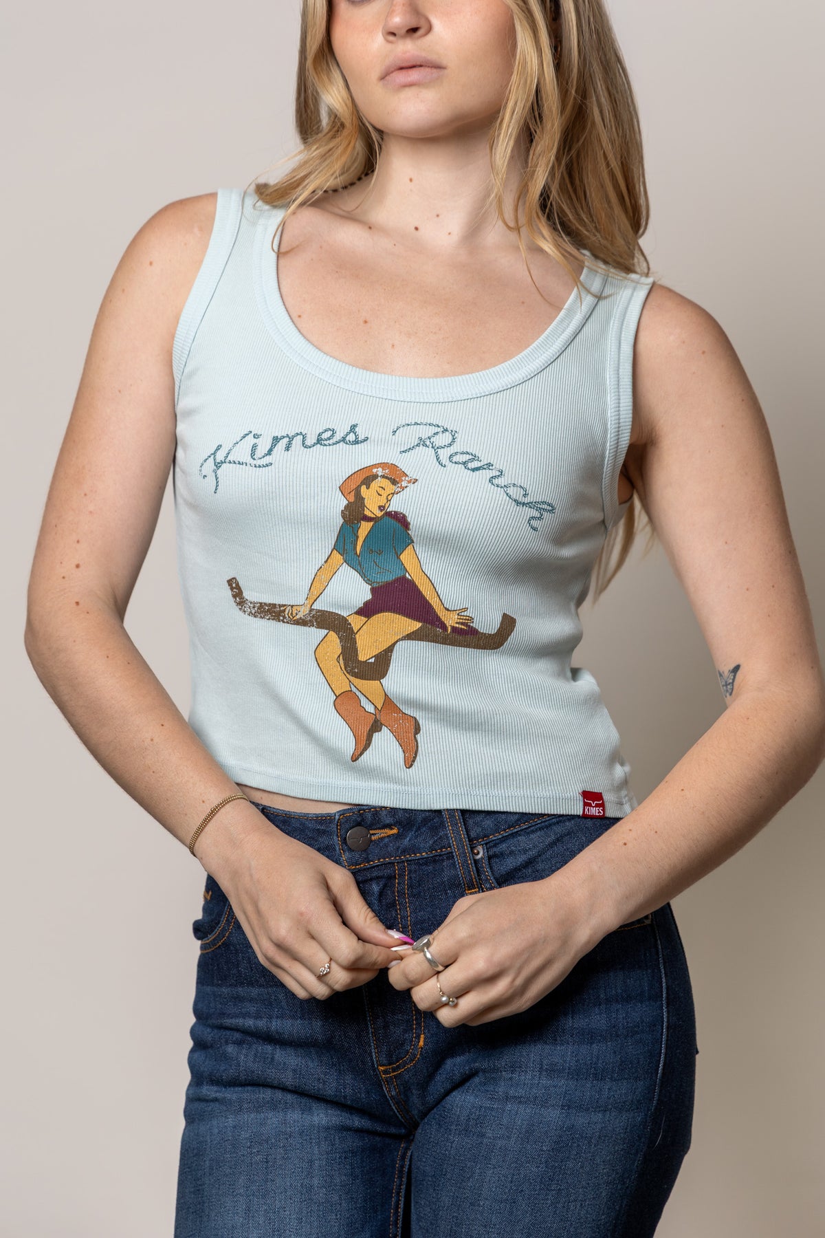 Kimes Ranch See Saw tank top in Ice Blue with a vintage pinup girl graphic and Kimes Ranch logo