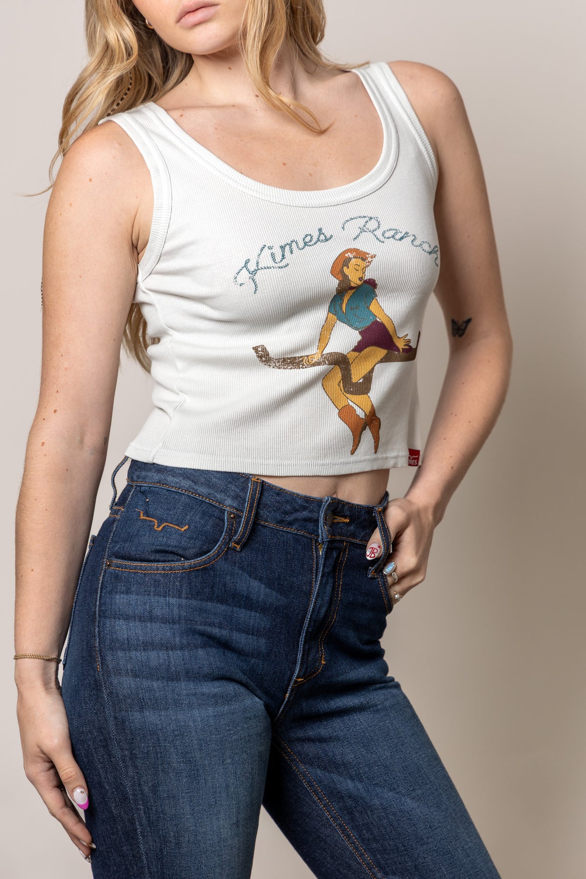 Kimes Ranch See Saw tank in Natural with a vintage pinup graphic and Kimes Ranch logo
