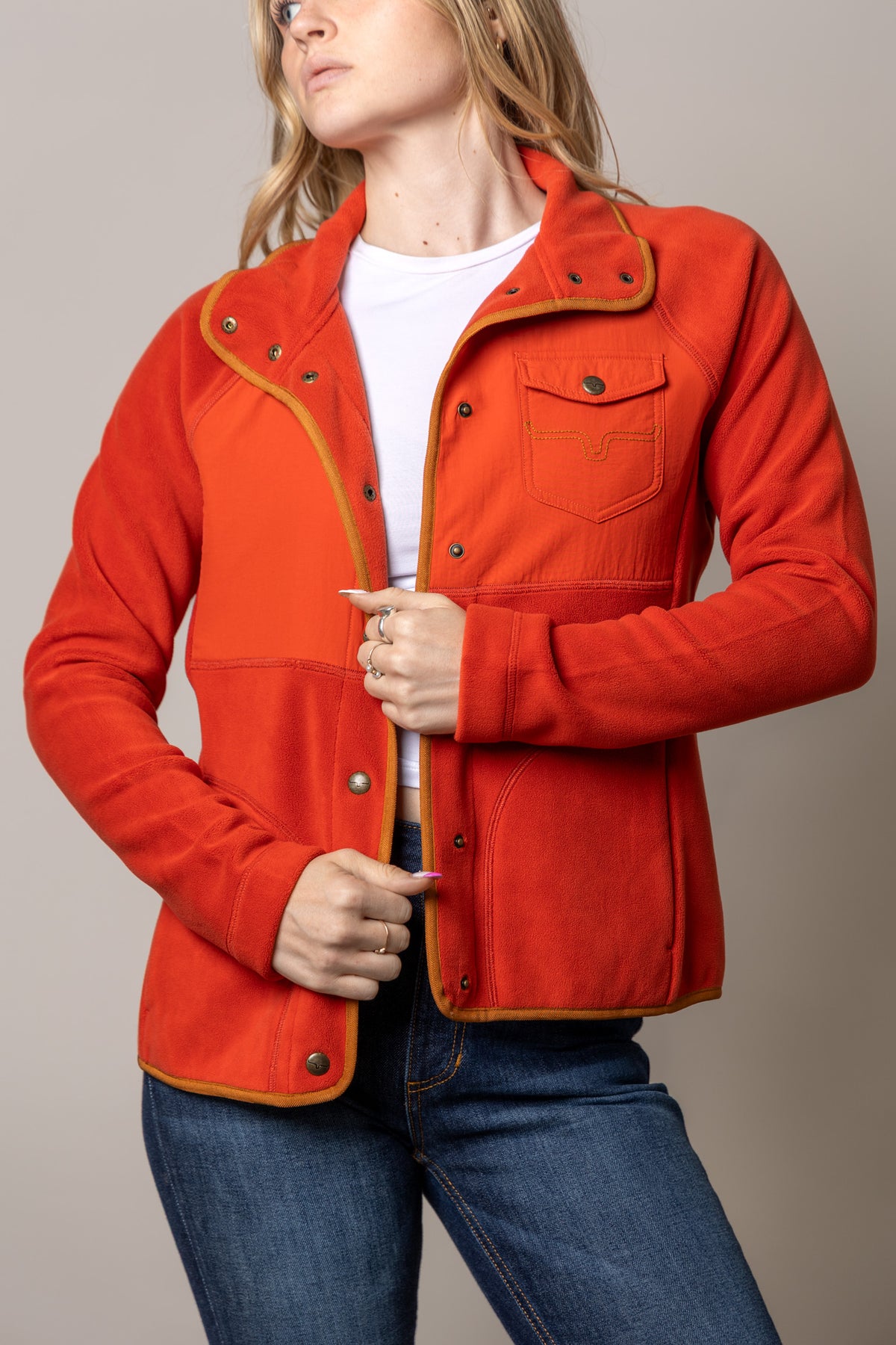 Kimes Ranch Selma Fleece sweatshirt in Brick Red with contrast tan trim and embroidered logo on the chest pocket