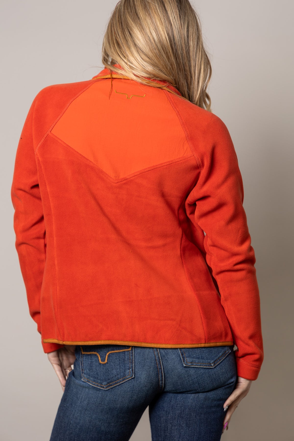 Kimes Ranch Selma Fleece sweatshirt in Brick Red, back view, with a back yoke and logo
