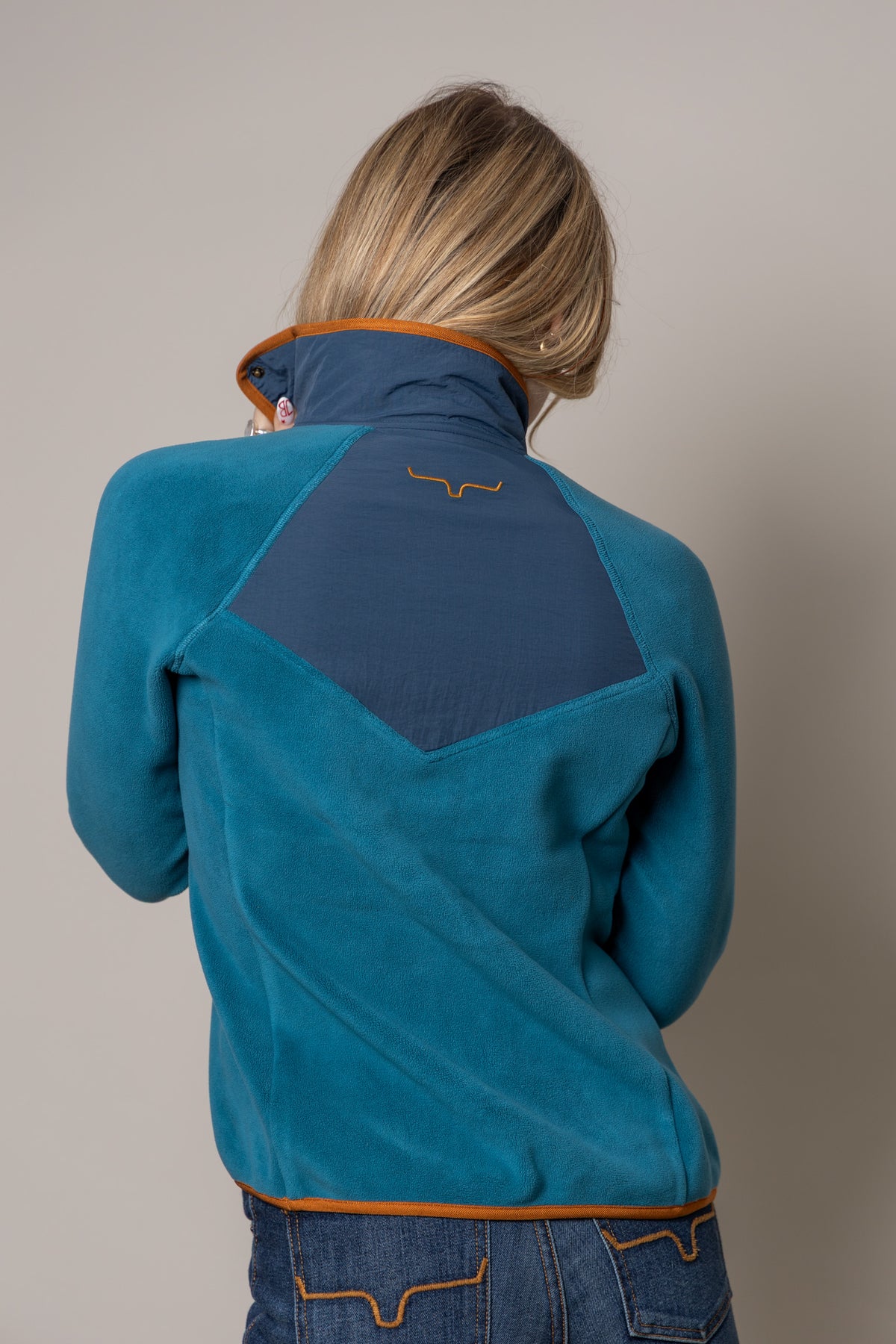Kimes Ranch Selma Fleece sweatshirt in Mid Blue, back view, with contrast back yoke and embroidered logo