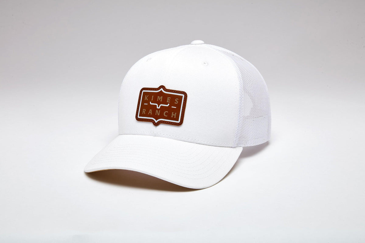 Kimes Ranch Sheridan White trucker hat with a brown logo patch on the front