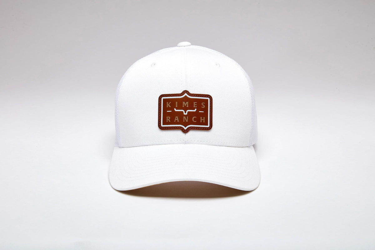 Kimes Ranch Sheridan hat in White with a brown logo patch on the front