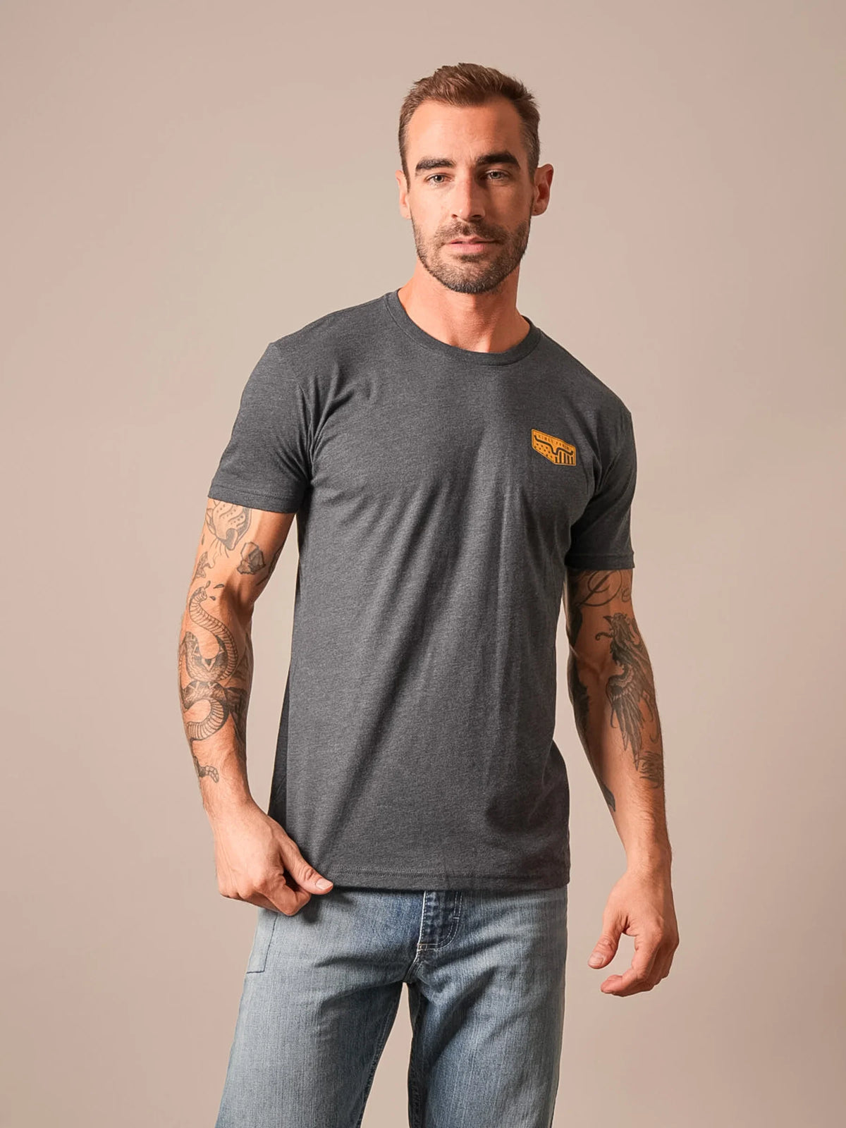 Kimes Ranch Spangled Charcoal short sleeve shirt with a chest logo