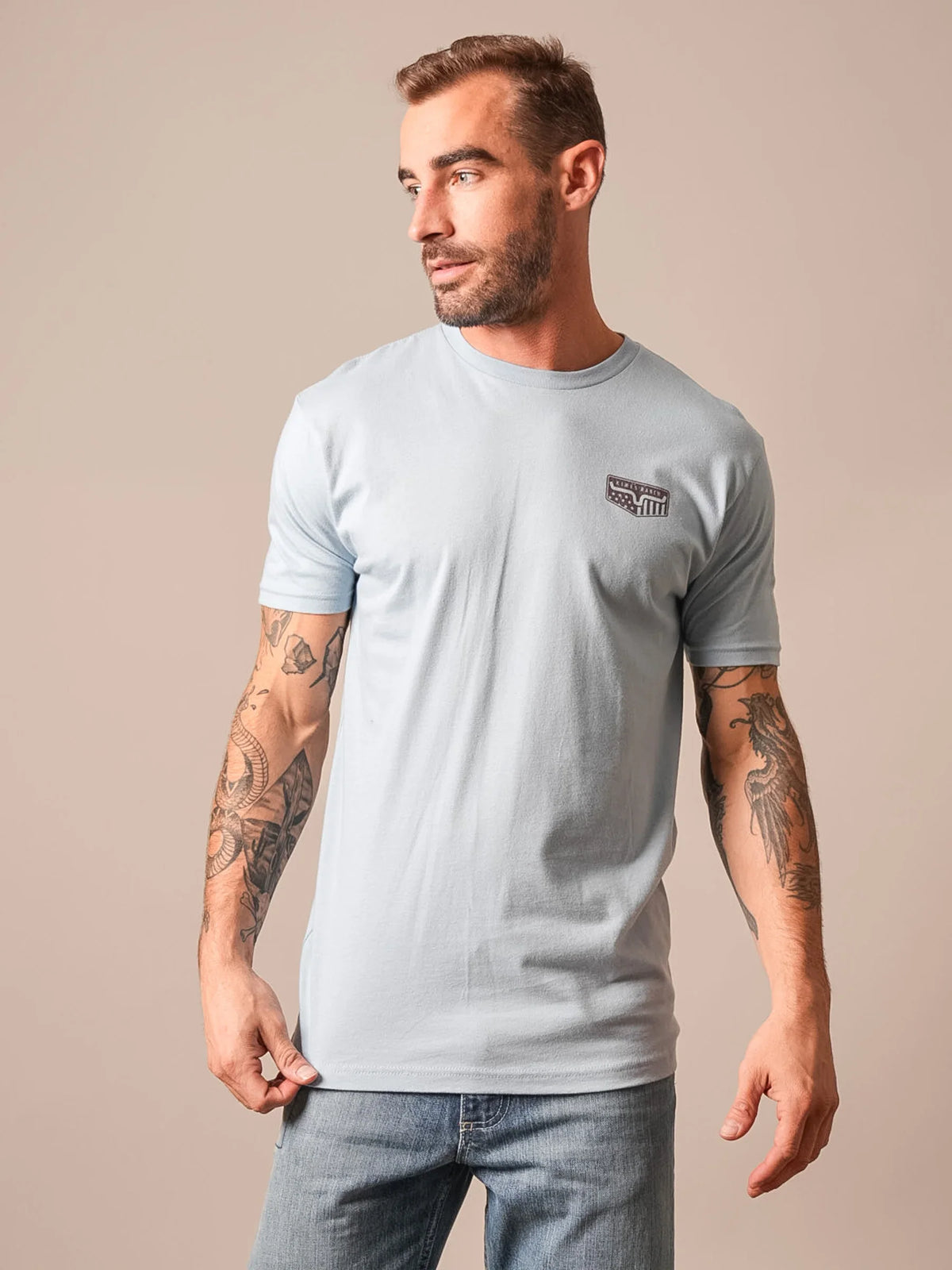 Kimes Ranch Spangled shirt in Stonewash with short sleeves and the Kimes Ranch logo on the chest