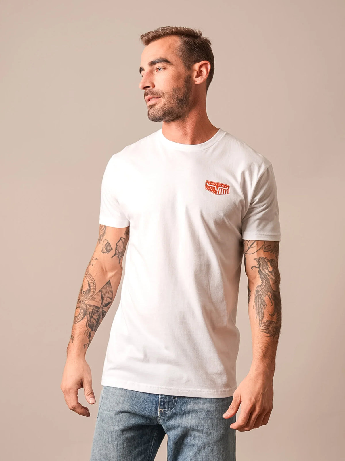 Kimes Ranch Spangled, side view, White short sleeve t-shirt with a red logo on the chest