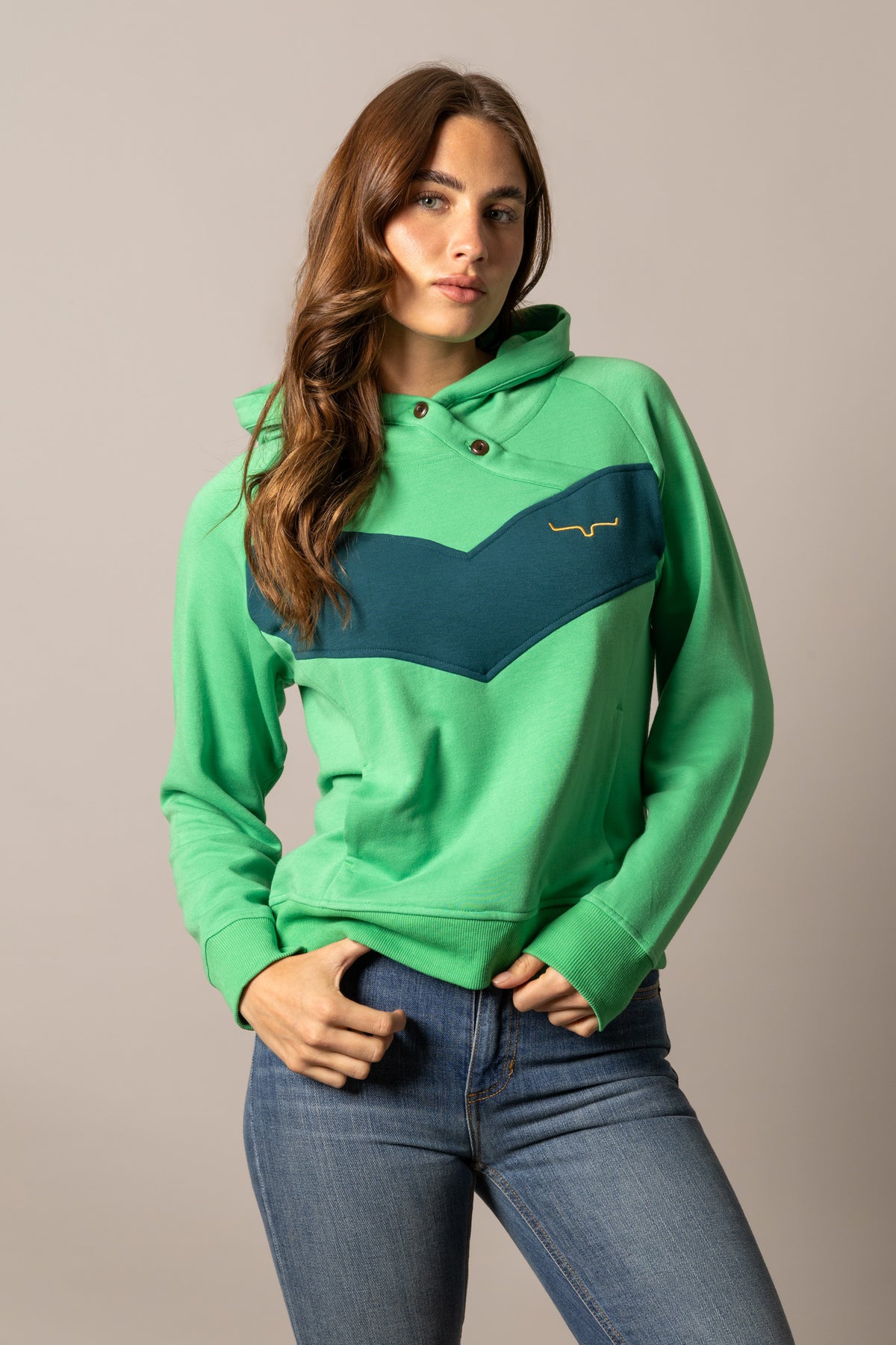 Kimes Ranch Stella hoodie in Kelly Green with a navy chevron panel and embroidered Kimes Ranch logo