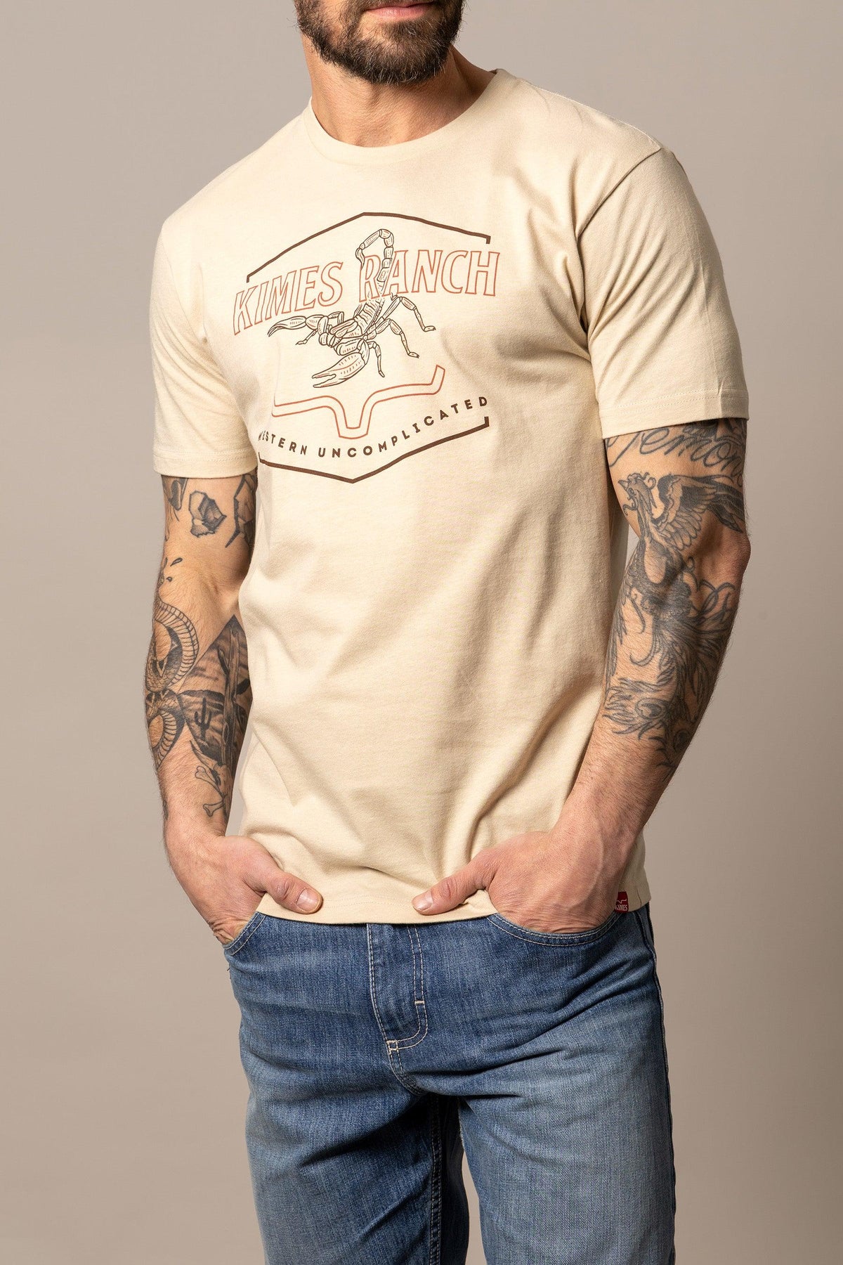 Kimes Ranch Sting shirt in Cream with a scorpion graphic and Western Uncomplicated text