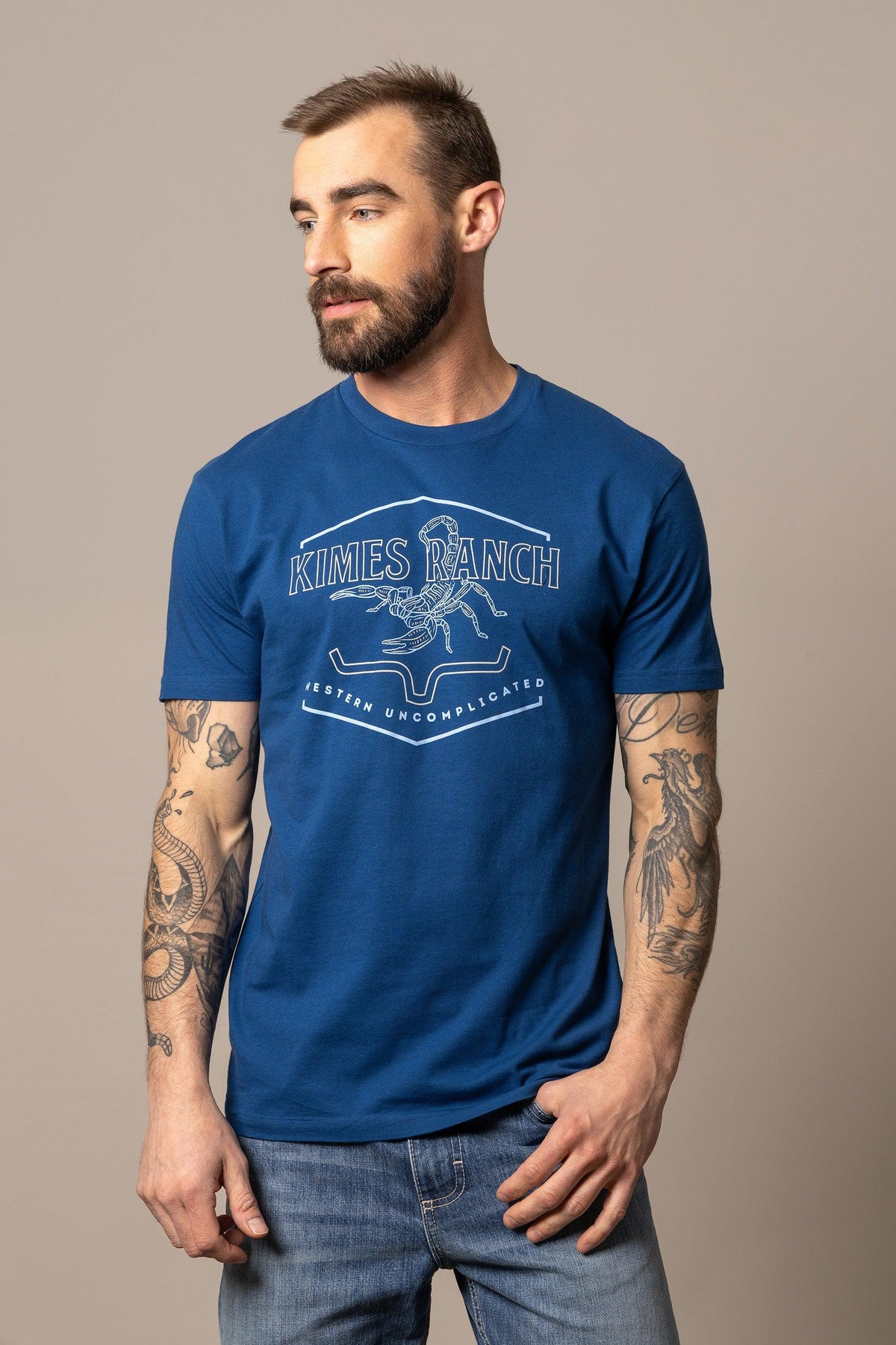 Kimes Ranch Sting shirt in Marine Blue with a scorpion graphic and Western Uncomplicated text