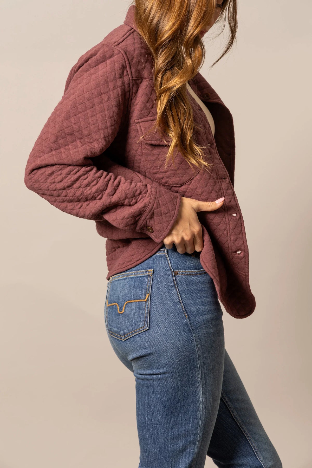 Kimes Ranch Susie Shacket in Mauve, side view, with quilted texture and button cuffs
