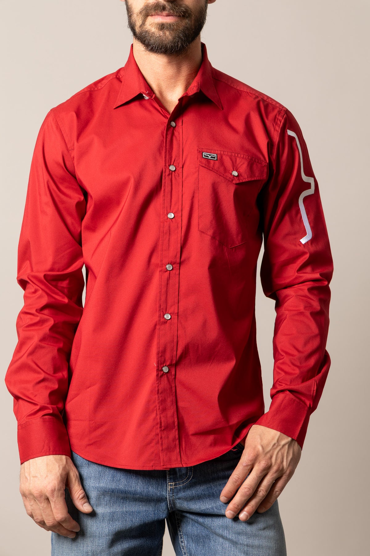 Kimes Ranch Talbott long sleeve dress shirt in Red with a chest pocket and a white graphic on the sleeve