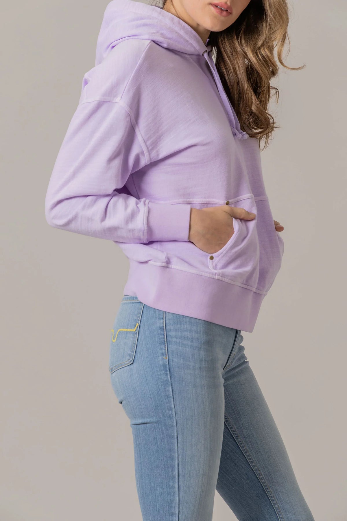 Kimes Ranch Tess Western Hoodie in Lavender, side view, with a kangaroo pocket and drawstring hood