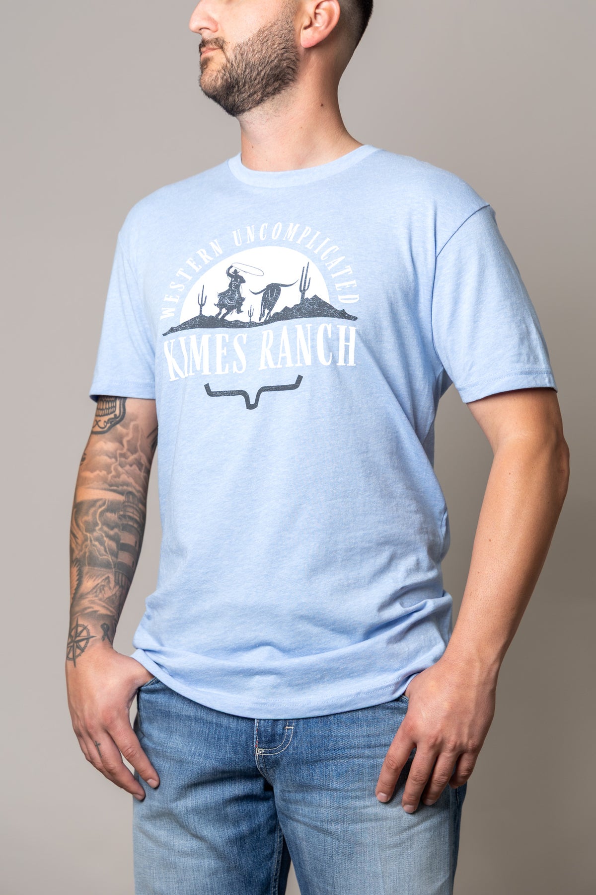 Kimes Ranch The Chase shirt in Heather Columbia Blue with Western Uncomplicated graphic and logo