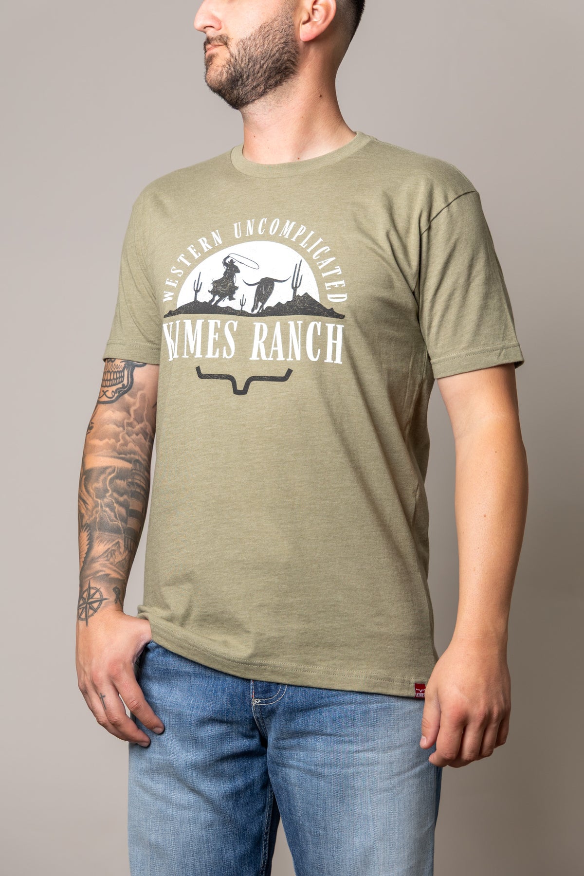 Kimes Ranch The Chase shirt in Light Olive with a Western Uncomplicated graphic and logo
