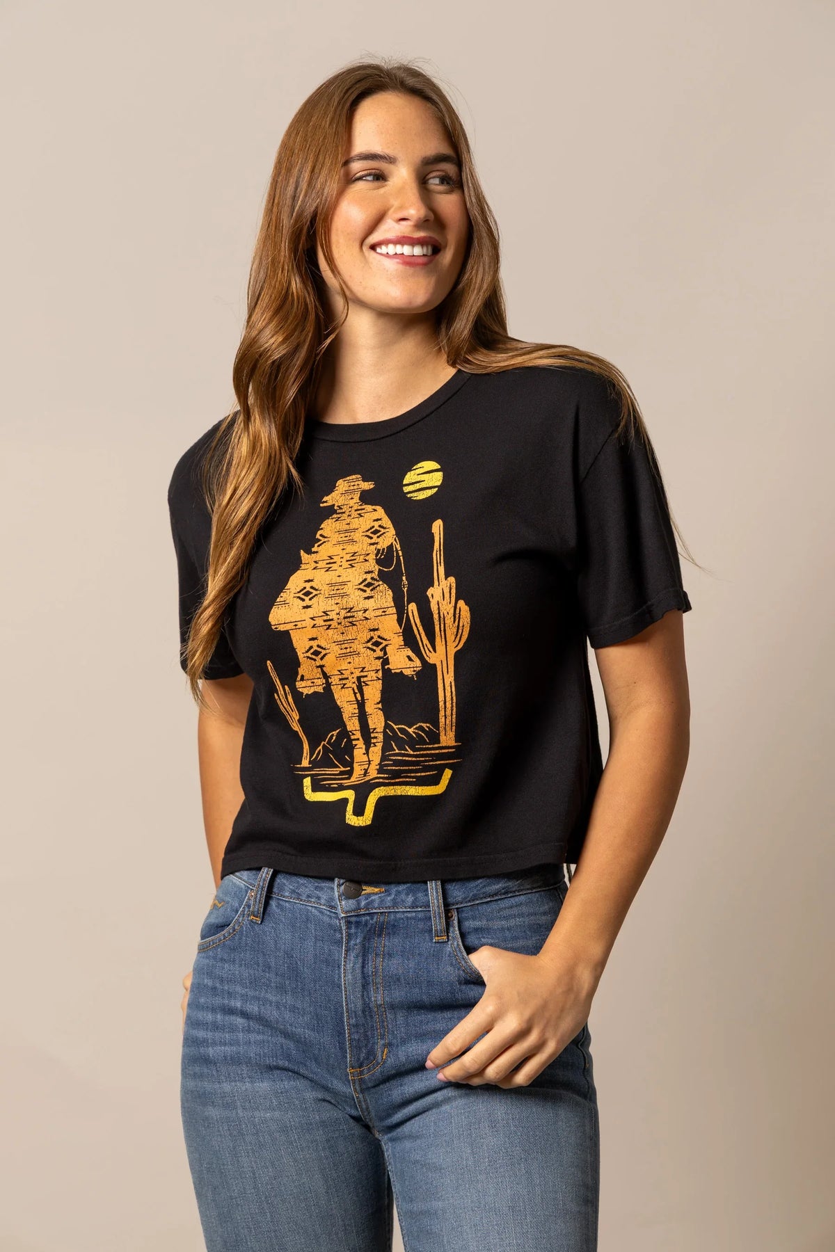 Kimes Ranch The Road shirt in Black with a gold graphic of a cowboy and cactus