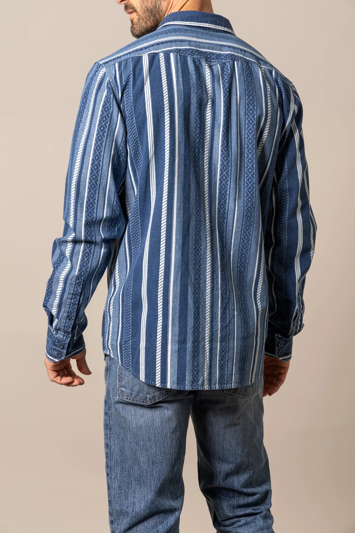Kimes Ranch Tombstone dress shirt in Indigo, back view, with vertical stripes and geometric patterns on the back