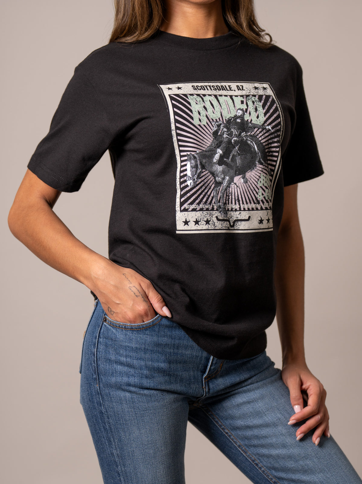 Kimes Ranch Top Bill shirt in Black with a vintage rodeo graphic featuring a cowboy on a bucking horse