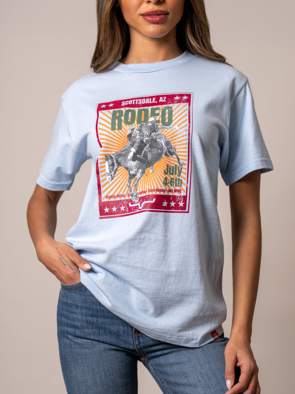 Kimes Ranch Top Bill shirt in Pacific Blue with a Scottsdale Rodeo graphic and longhorn logo