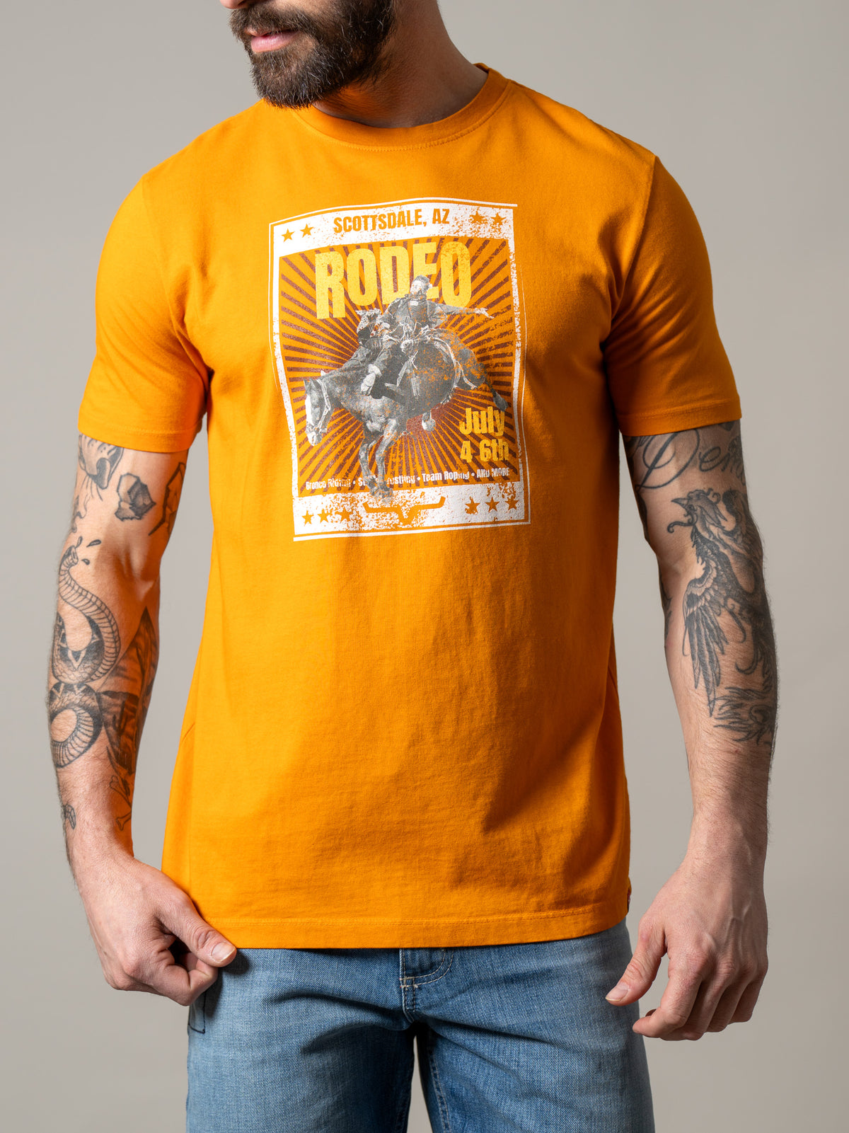 Kimes Ranch Top Bill shirt in Vintage Orange with a Scottsdale Rodeo graphic print