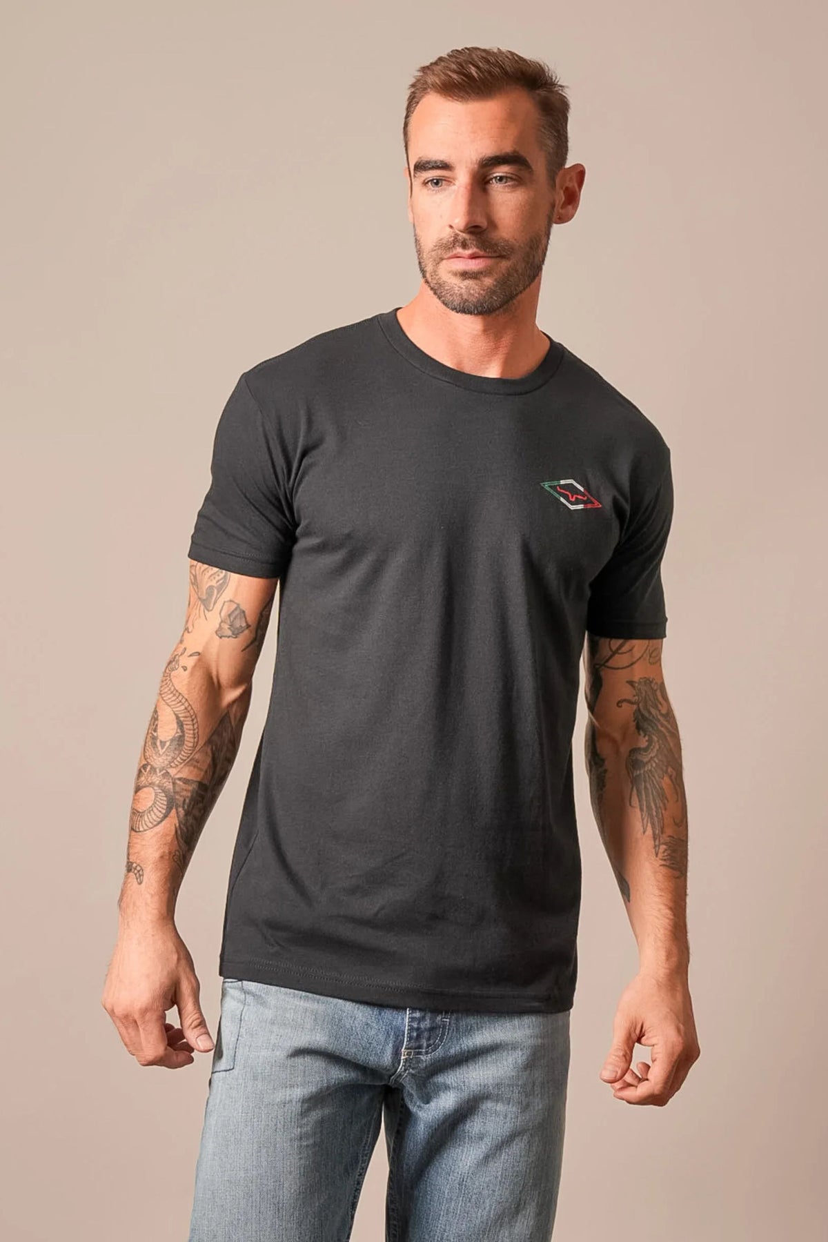Kimes Ranch Tredwell shirt in Black with a crew neck and short sleeves and a logo on the chest