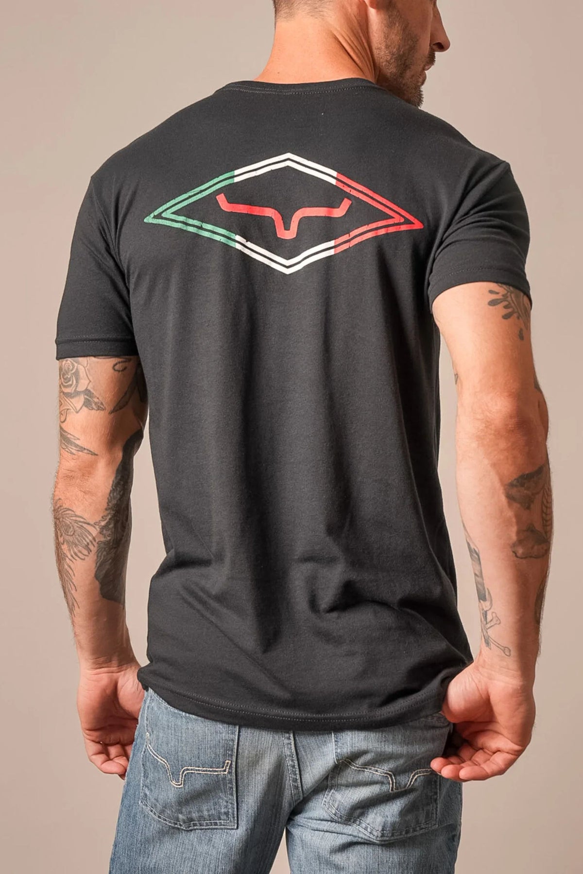 Kimes Ranch Tredwell shirt in Black, back view, with a back graphic of the Kimes Ranch logo in a diamond