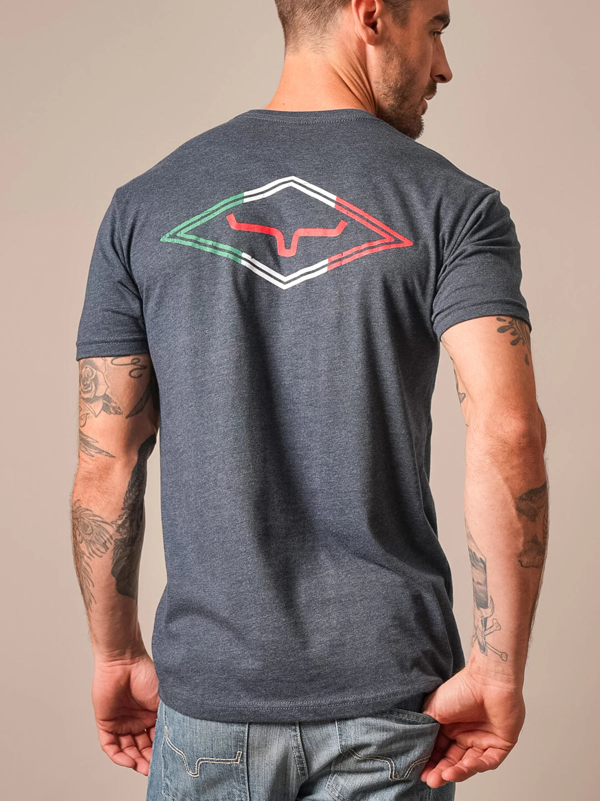 Kimes Ranch Tredwell shirt in Midnight Navy, back view, with a back graphic of the Kimes Ranch logo inside a diamond outlined