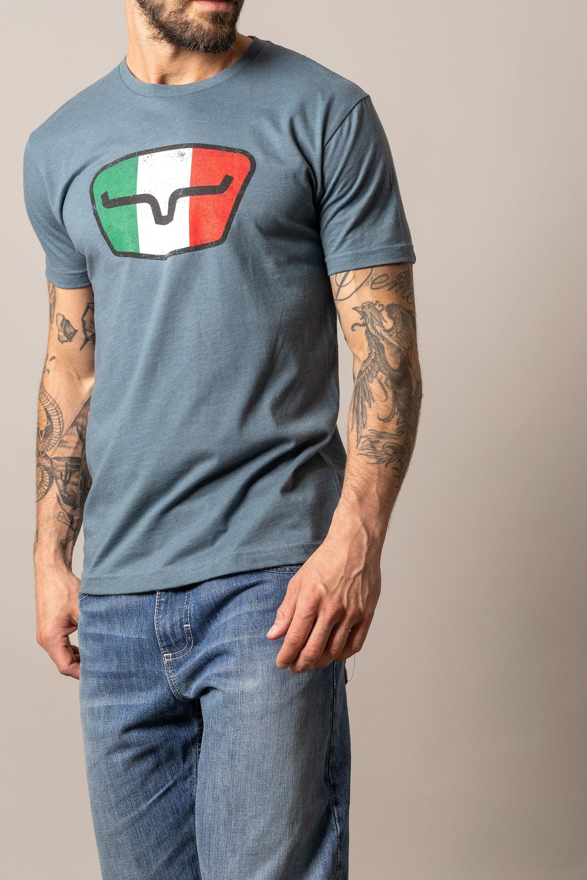 Kimes Ranch Tri-Color Tee in Indigo with a shield graphic featuring the Italian flag colors