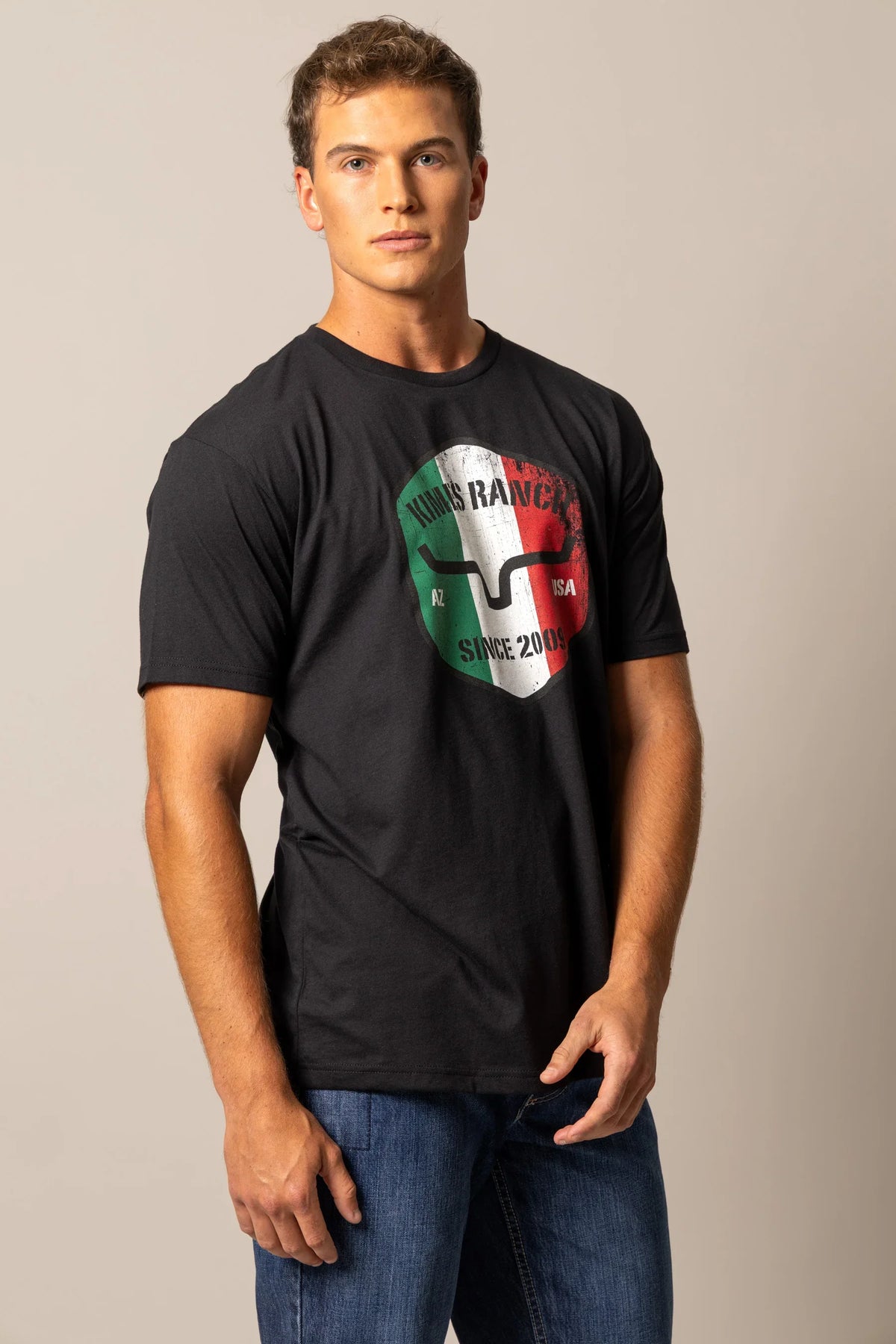 Kimes Ranch Triple Stripe shirt in Black with a graphic featuring the Kimes Ranch logo and text reading AZ USA SINCE 2009