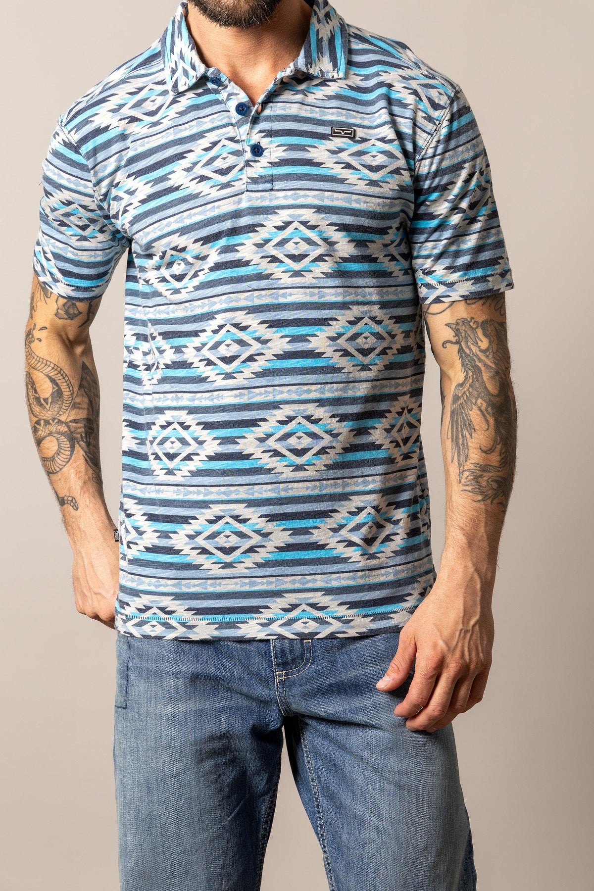 Kimes Ranch Tulum Polo in Navy with a geometric diamond pattern and short sleeves