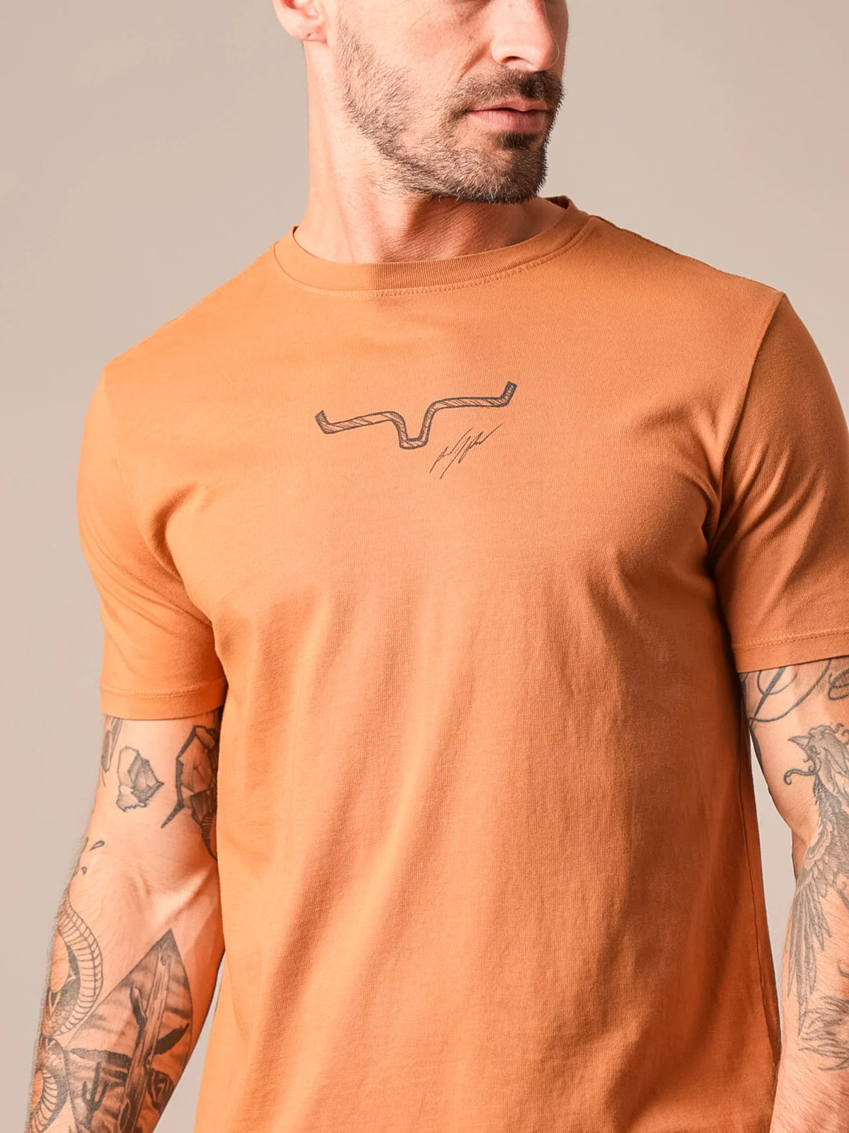 Kimes Ranch Uh Oh RP shirt in Work Wear Brown with a longhorn logo and signature graphic on the chest