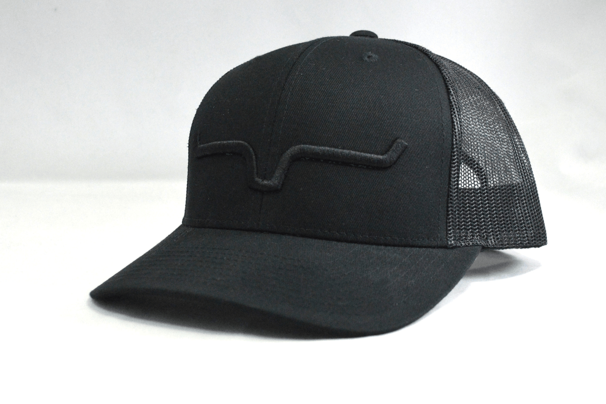 Kimes Ranch Weekly Trucker Hat, side view, in black with a tonal embroidered logo on the front panel and mesh back