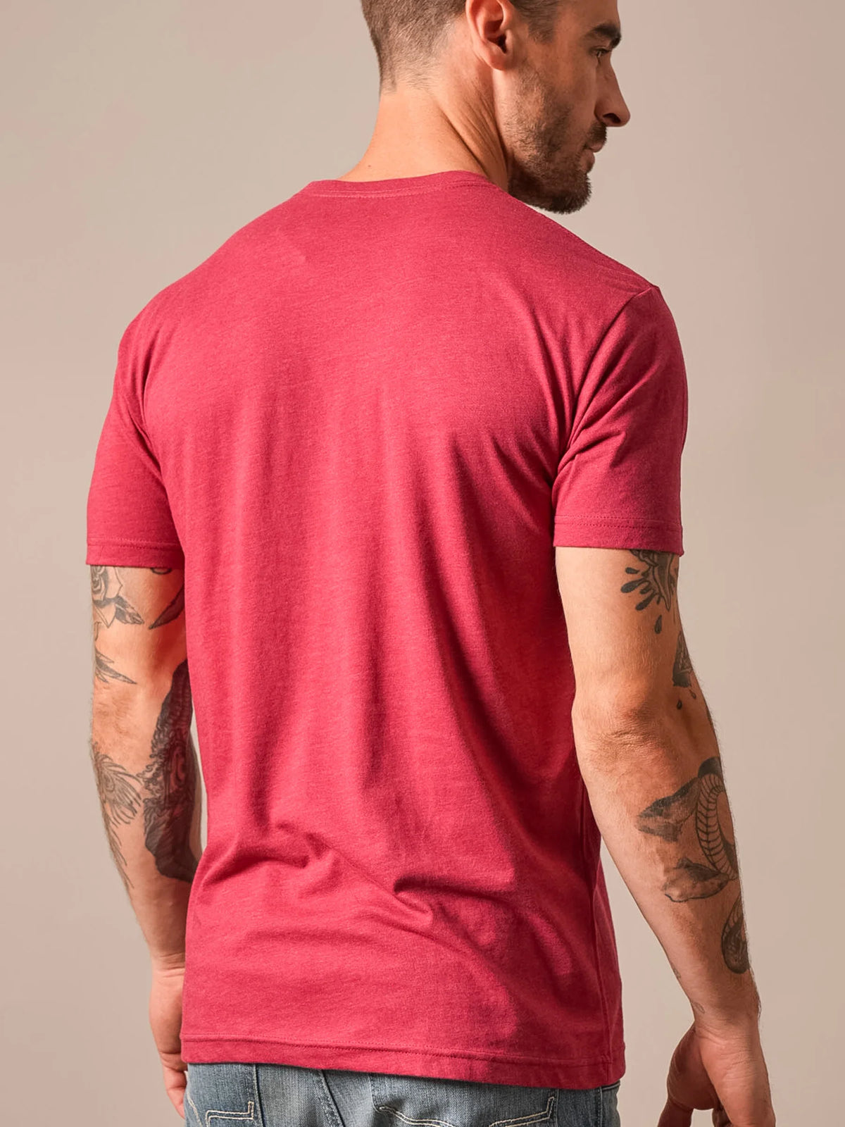 Kimes Ranch Vintage Badge shirt in Cardinal, back view, with short sleeves and a crew neck